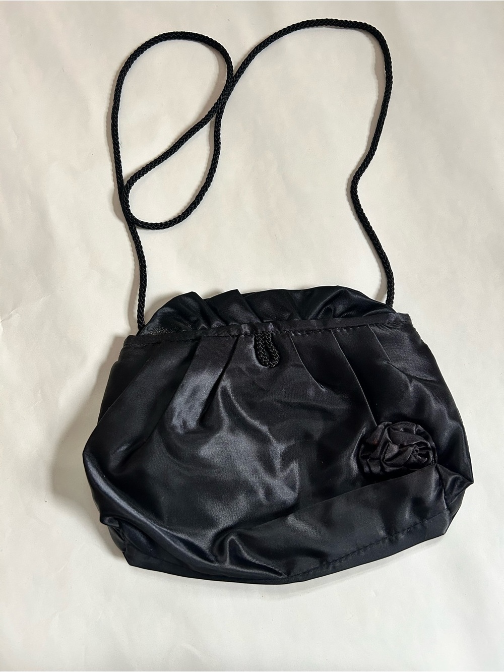 Black Satin Drawstring Shoulder Bag with Rosette Accent